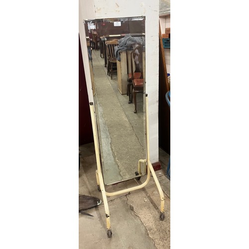 300 - A tubular metal shop mirror