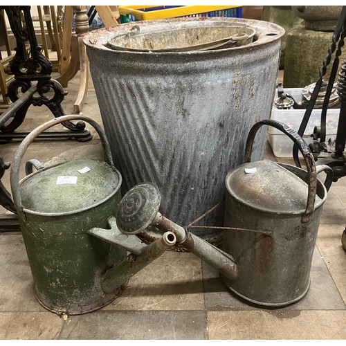 305 - A galvanised dolly tub, bucket and two watering cans