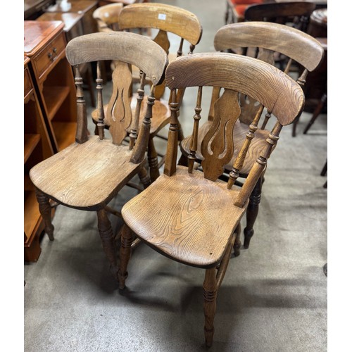 198 - A set of four Victorian elm and beech kitchen chairs