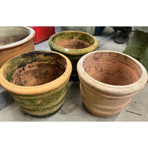 309 - Four terracotta garden planters