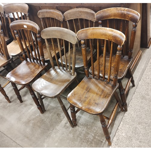 235 - A Harlequin set of six Victorian elm and beech kitchen chairs