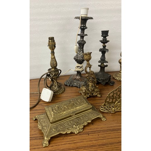 322 - Assorted candelabra, trivets and a jewellery box