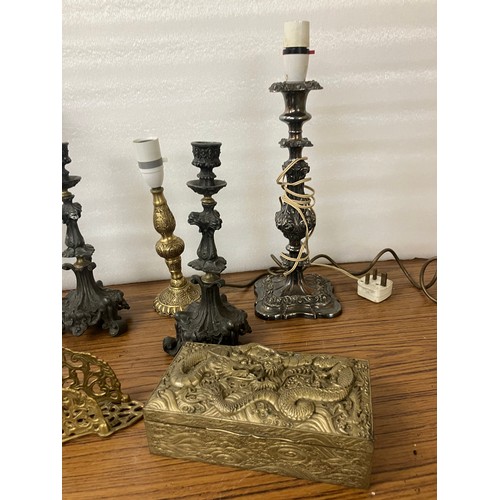 322 - Assorted candelabra, trivets and a jewellery box