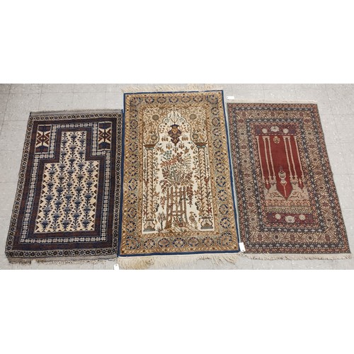 238 - Three assorted eastern rugs,  86 x 143cms, 87 x 148cms and 94 x 157cms