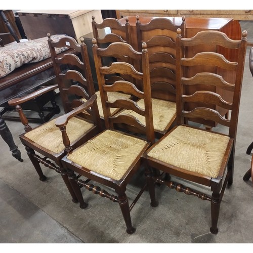 239 - A set of five 18th Century style oak and rush seated dining chairs