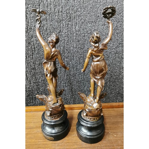 327 - A pair of French bronze effect figures, on black socles, L'Été and Le Printemps