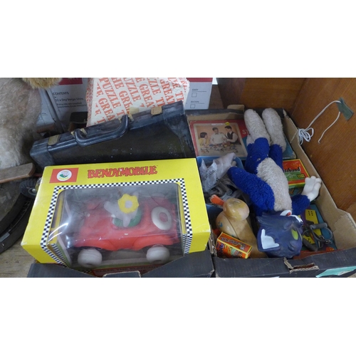 5294 - A quantity of vintage toys including a dog, Tom the Cat, dartboards, wooden duck, etc.