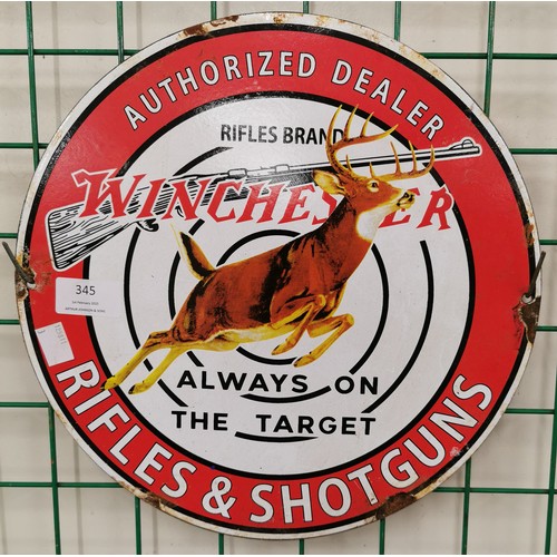 345 - A Winchester Rifles and Shotguns enamelled advertising sign