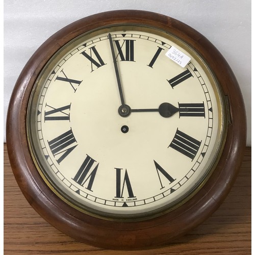 364A - A Victorian mahogany circular wall clock