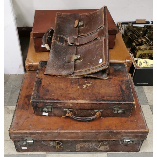 354 - Four vintage leather suitcases and a bag