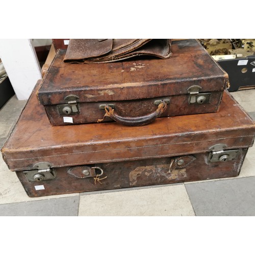 354 - Four vintage leather suitcases and a bag