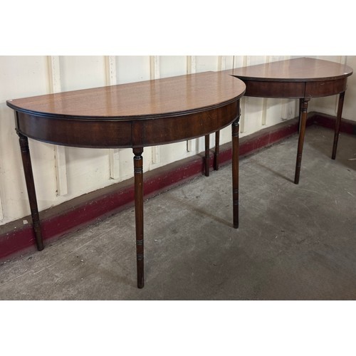 289A - A pair of Victorian mahogany demi-lune console tables