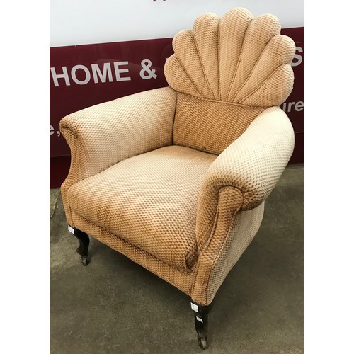 227A - A Victorian mahogany and fabric upholstered armchair