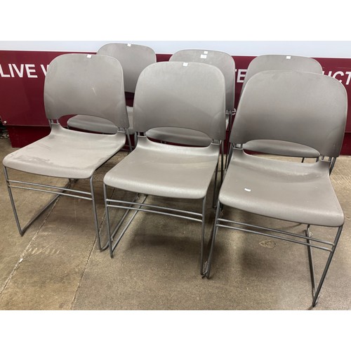 121 - A set of six Herman Miller plastic and tubular metal Limerick stacking chairs