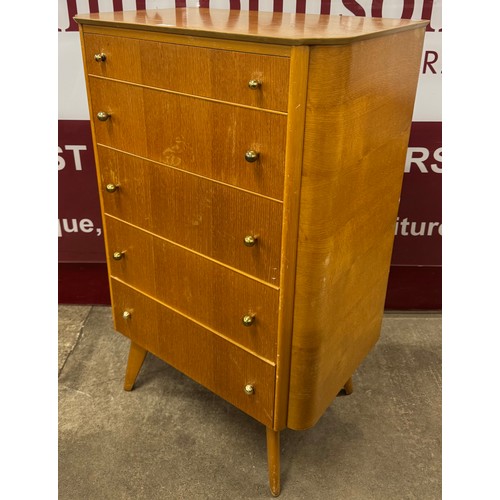 120 - A Homeworthy light oak chest of drawers