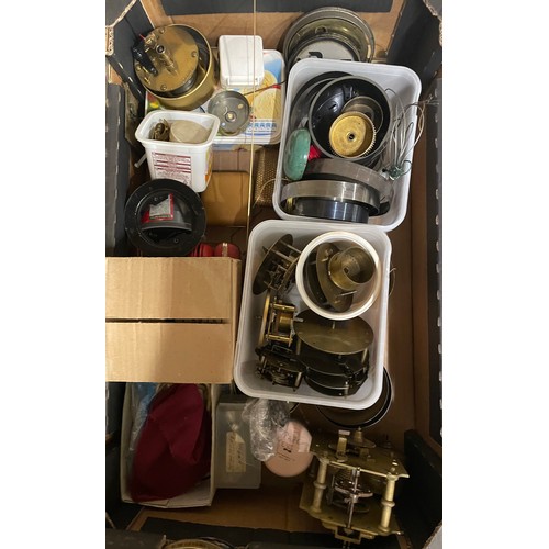 341A - Two boxes of assorted clock parts, glasses, dials, bezels, etc.