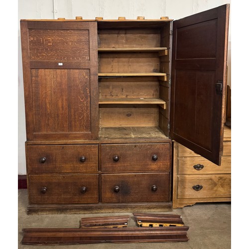 150 - A George III oak housekeepers cupboard