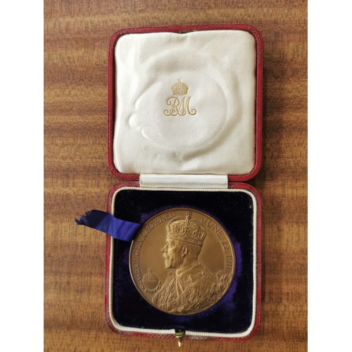 7209 - A George V and Queen Mary Royal commemorative bronze  medallion, cased