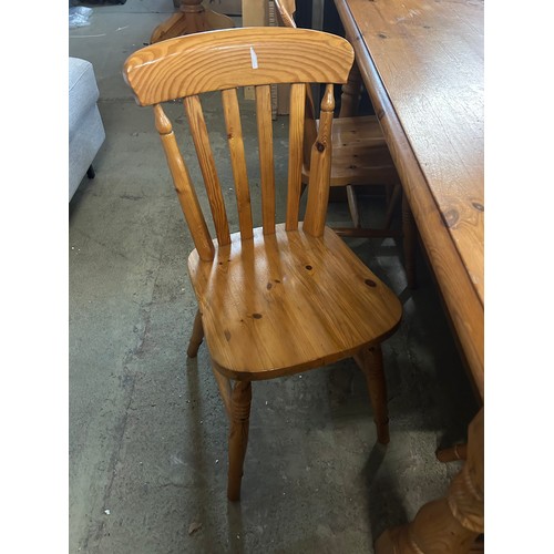 3246 - A pine kitchen table and six chairs