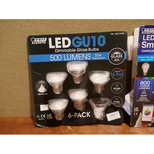 6063 - Feit glass dimmable bulbs and Feit LED smart A60 bulbs (351-111,113) *This lot is subject to VAT