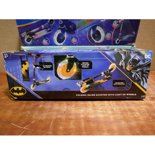 6112 - Three children's in-line folding scooters: Batman, Disney stitch, and electro life nova