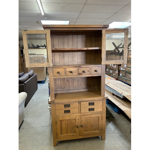 3294 - A pine 6 drawer, 4 door dresser