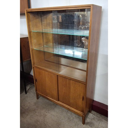 18 - A Herbert Gibbs teak side cabinet