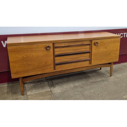 38 - A teak sideboard