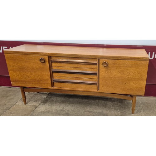 38 - A teak sideboard