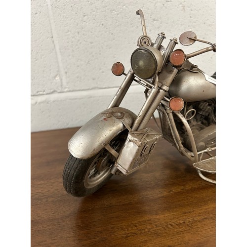 3095 - A silver painted motorbike ornament