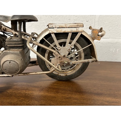 3095 - A silver painted motorbike ornament