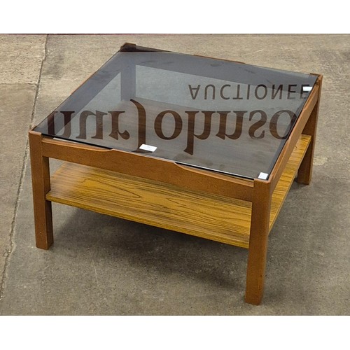 46 - A Myer teak and glass topped square coffee table