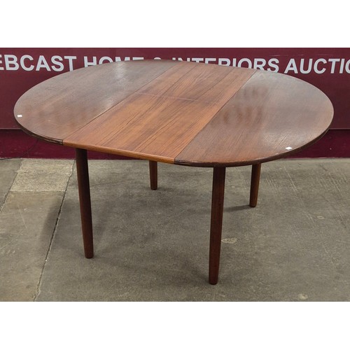 48 - A Danish teak oval extending dining table