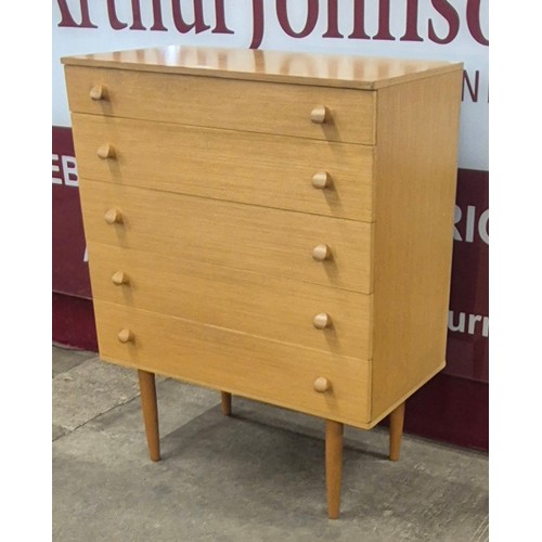 54 - A teak chest of drawers