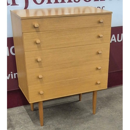 54 - A teak chest of drawers