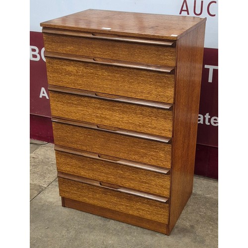 60 - An Avalon teak chest of drawers