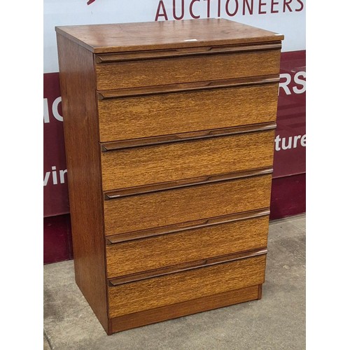 60 - An Avalon teak chest of drawers