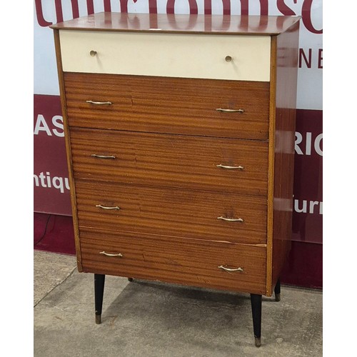 66 - A tola wood chest of drawers