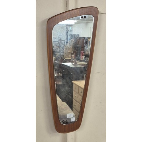 72 - A teak asymmetrical framed mirror