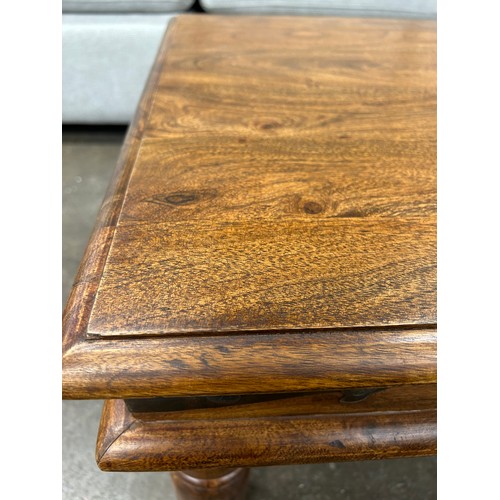 3167 - A square hardwood coffee table