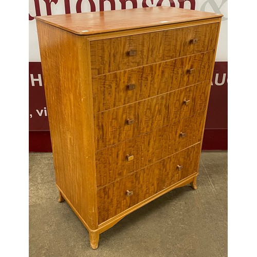 92 - A walnut chest of drawers