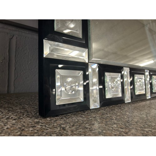 3133 - A large mirror with black squares