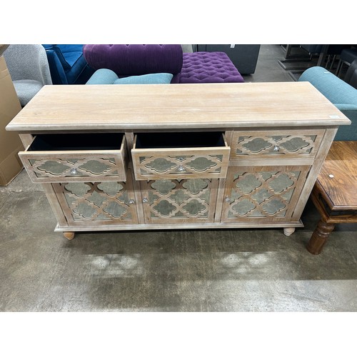 3166 - A wood lattice mirrored sideboard