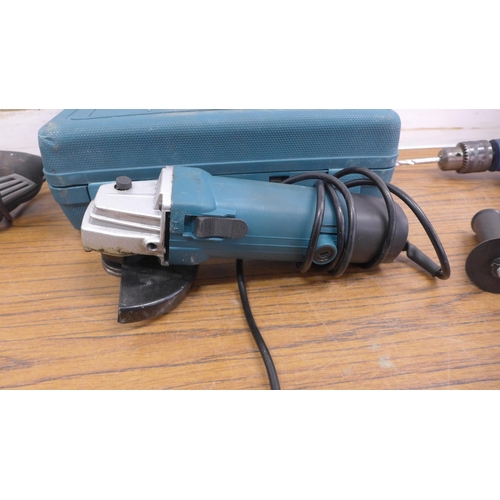 5027 - Three assorted power tools -A Hilka Max 230v angle grinder, a 240v hammer drill and a 240v GF30 angl... 