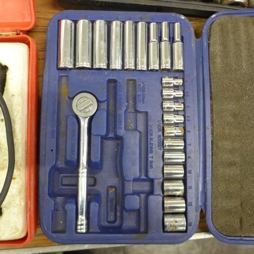 5028 - A quantity of tools and other items including two cased socket sets, cased SDS drill bits, a Weller ... 