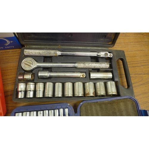 5028 - A quantity of tools and other items including two cased socket sets, cased SDS drill bits, a Weller ... 