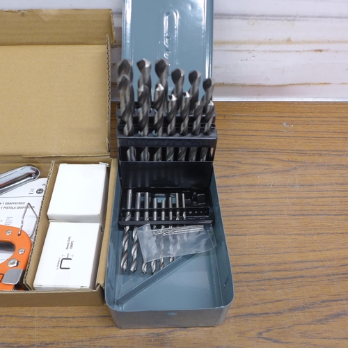 5061 - A stapler, 1 - 13mm drill set and a nut/stud extractor set - unused