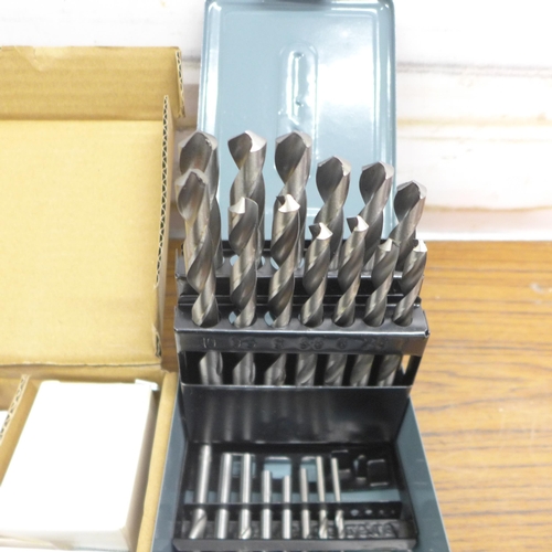 5061 - A stapler, 1 - 13mm drill set and a nut/stud extractor set - unused