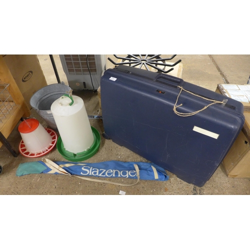 5241 - A Delsey lockable suitcase with key, a chicken feed, a chicken water feeder, a bucket and a hockey s... 