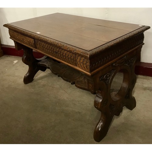 113 - An 18th Century style Italian carved walnut two drawer centre table